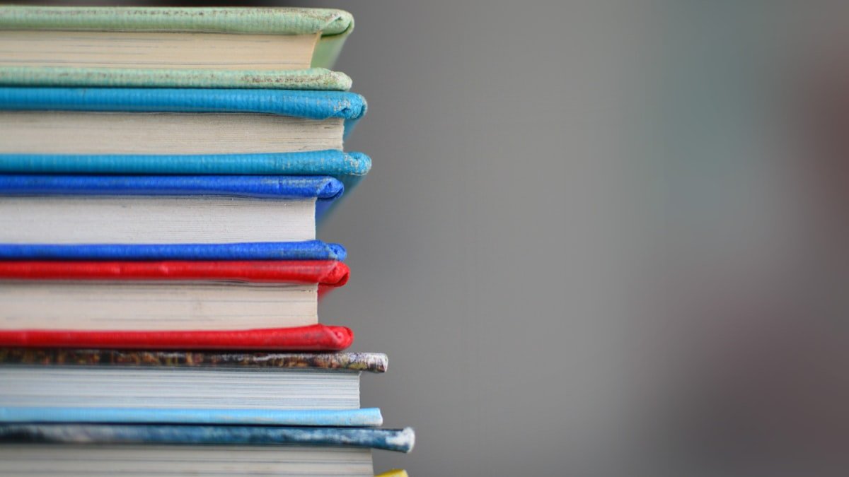 Digital library resources and academic research tools open on adult student desk
